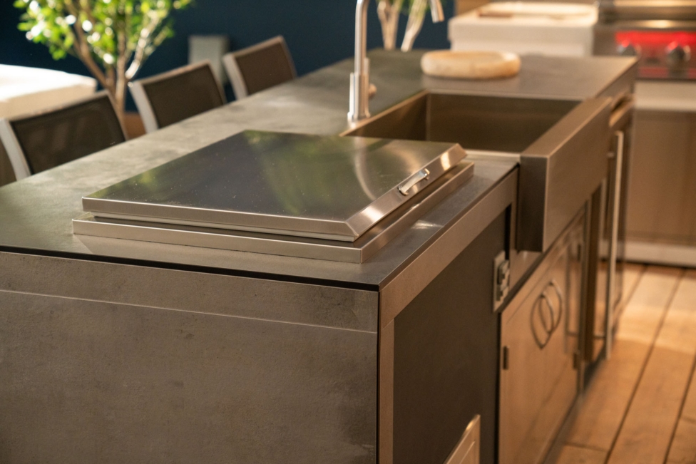 Outdoor bar layout next to grill create a better flow for cooking and entertaining